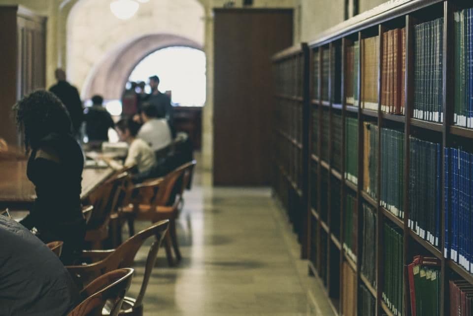 Students working in a library
